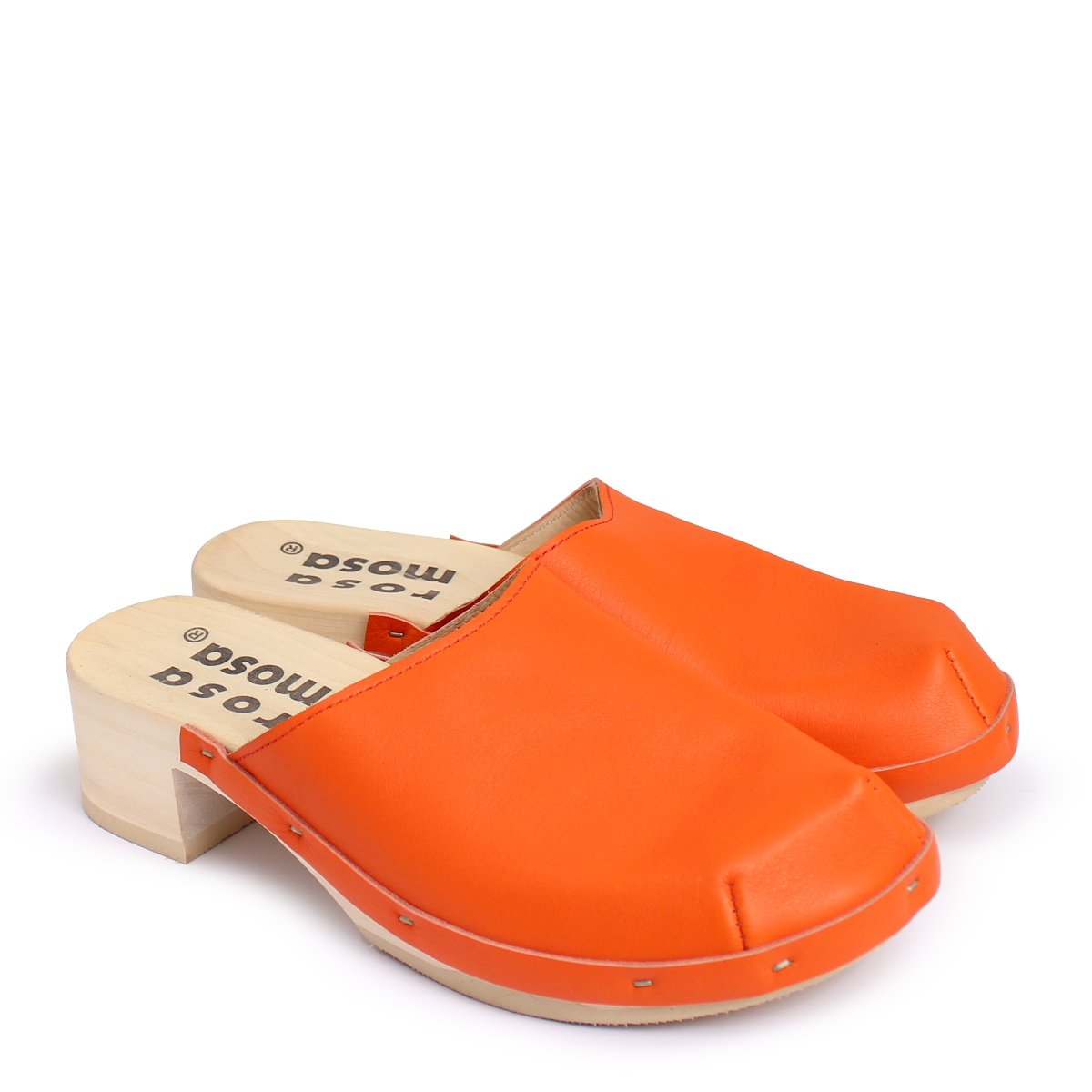 Orange clogs with wooden soles on a white background