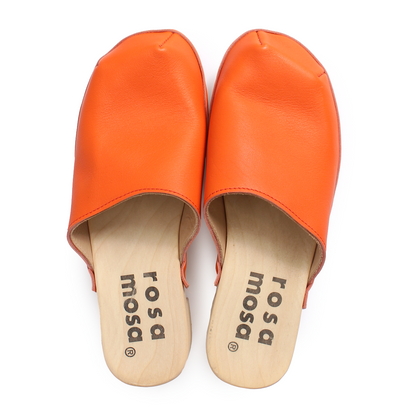 Pair of orange sandals with 'Rosa Mosa' branding on a white background